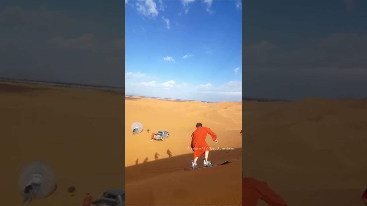 Sandboarding and Zorbing in Sahara desert