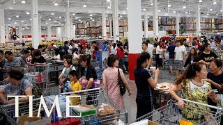 Amid Hour-Long Lines, Customers Fight Over Products As Costco Opens First Store In China | TIME