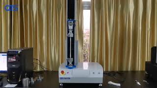 The tensile material tester completes the test and the fixture returns automatically