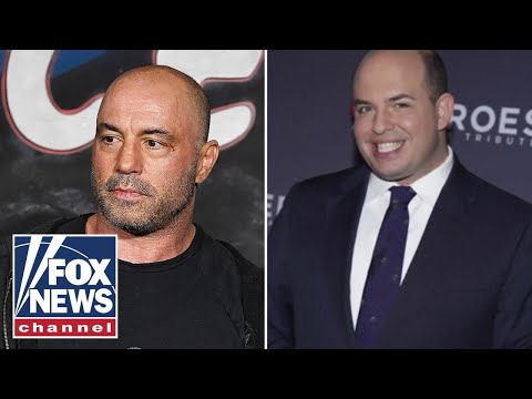 Joe Rogan questions Brian Stelter's credibility in profanity-laced segment.