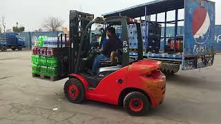 Loading pallets onto a Truck With Sit Down Forklift @ForkliftSkills