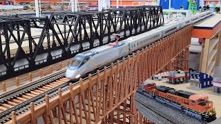 Amtrak acela meets big BNSF freight at the Rooster Railroad.