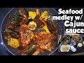 DAMPA BUTTERED GARLIC SEAFOOD WITH CAJUN SAUCE