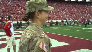 Army Captain surprises daughter at Wisconsin Football Game