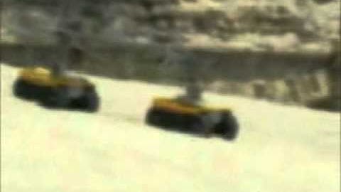 Dual-track robot for motion in challenging  terrain