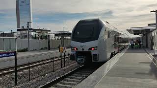 TEXrail leaving Iron Horse Station