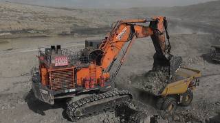 The Perfect View of the Hitachi EX2600 Excavator Loading Overburden into HD785 & CAT 777 Dump Trucks