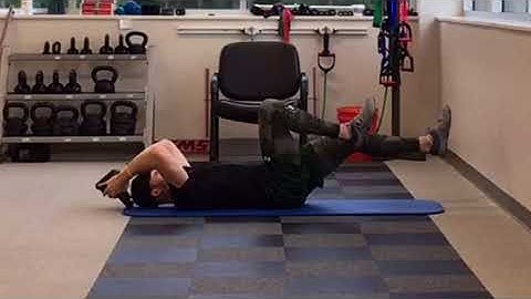 Kettlebell Deadbug to Reverse Crunch