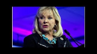 Oklahoma’s governor angers the NRA and gay rights groups — on the same day