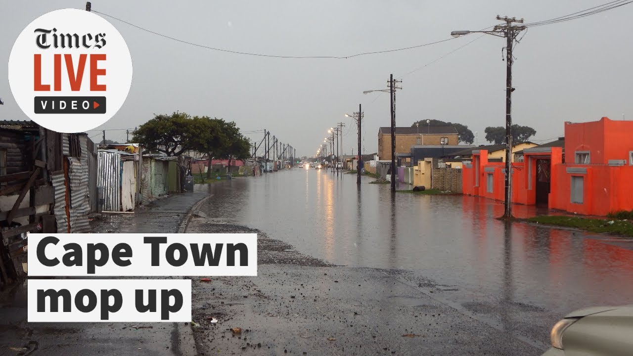 A month's rain in 24 hours: Cape Town residents mop up after downpour ...
