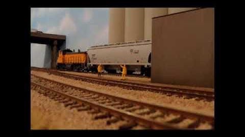 Atlas O-Scale Union Pacific MP15 arrives at the local grain elevator