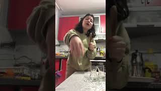 Girl Falls Into Dishwasher While Singing in the Kitchen