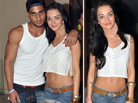 Amy Jackson's BARES NAVEL at SUNBURN - YouTube