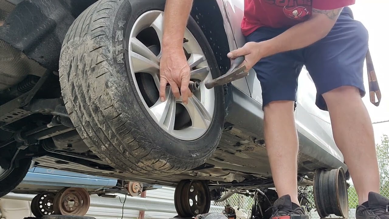 HOW TO GET FORD FOCUS LUG NUTS OFF YouTube HOW TO GET FORD FOCUS LUG NUTS OFF YouTube