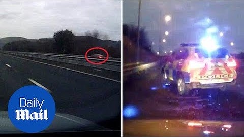 Horrified motorist spots car driving wrong way on busy motorway - Daily Mail