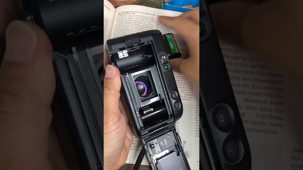 Kyocera zoomtec 90 how to load a film - YouTube