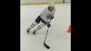 Power Skating: Defenseman drills.  Backwards transitions & escapes with puck