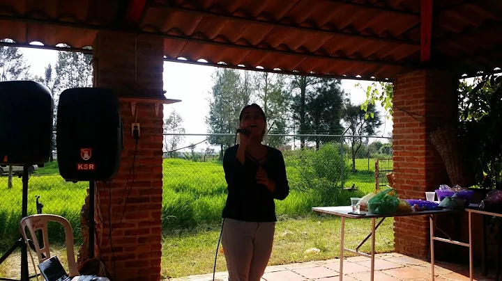 Christina Vasquez singing at Dad's birthday party