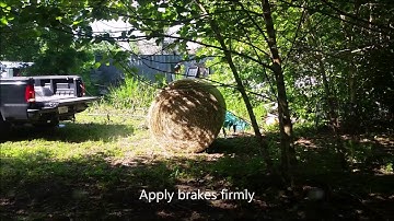 Easiest way to unload round hay bale