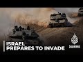 Troops and heavy weaponry mass at Gaza border