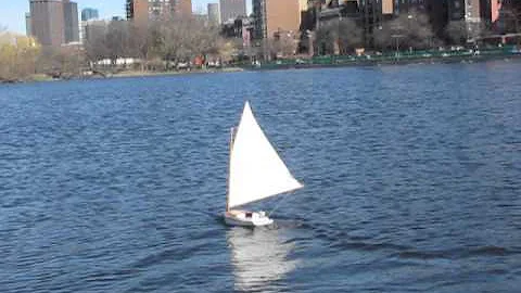 R/C model catboat sailing at Storrow Lagoon Boston