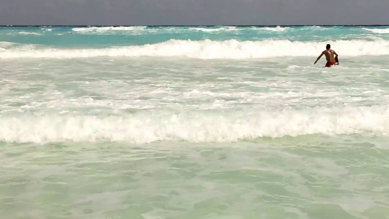 Mexican lifeguards saving a drowning victim at a beach in Cancun YouTube