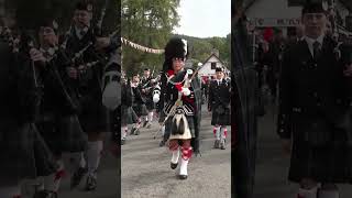 Drum Major Ronnie Rennie Leading Kintore Pipe Band On The March To 2022 Braemar Gathering