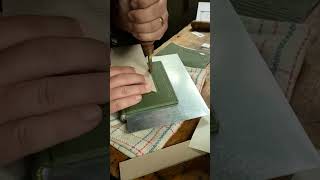 Hand-tooling a Leather Book #shorts #bookbinding