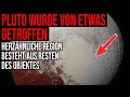 Pluto wurde von etwas getroffen