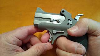 Bond Arms roughneck and Bianchi speed strips. And removal of the trigger guard for improved accuracy