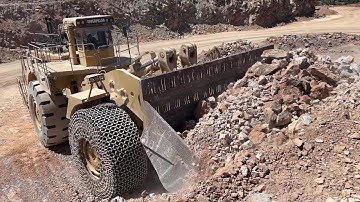 Huge Caterpillar 994 Wheel Loader Loading Caterpillar 777F Dumpers - Samaras Mining Group