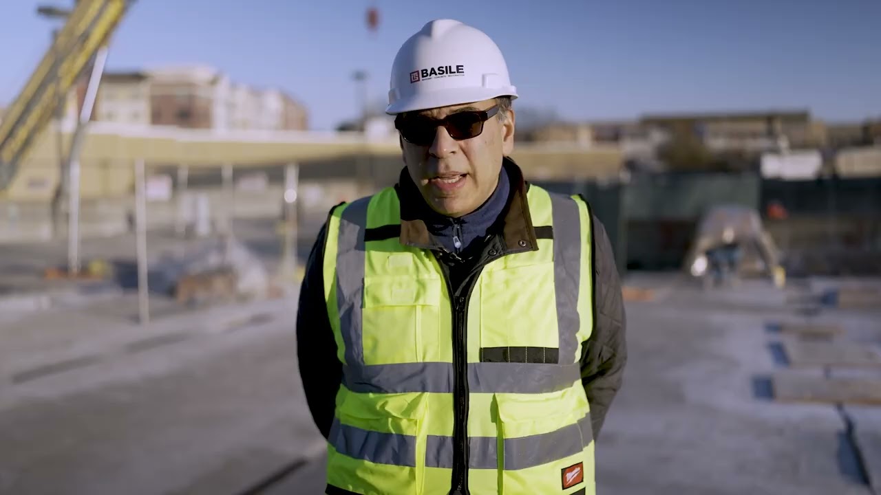 TG Basile team member in a hard hat on site, from the Project Recap