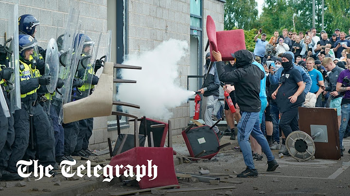 Anti-immigration protesters smash through migrant hotel in Rotherham