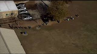 Bomb, gun threats lock down GA school district