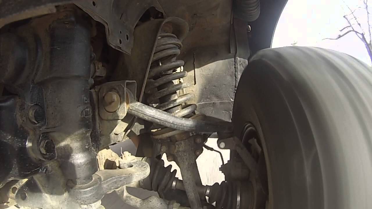 Sportage hitting speed humps, front suspension - YouTube