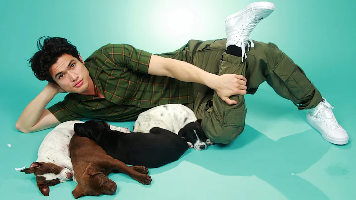 Charles Melton Plays With Puppies While Answering ...