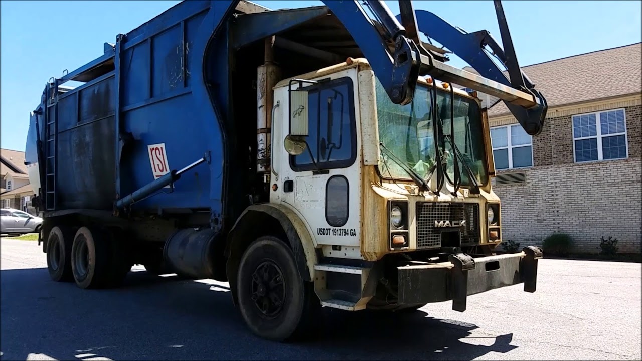 Rakestraw Sanitation Inc. Leach Millennium Mack MR Front Loader Trash
