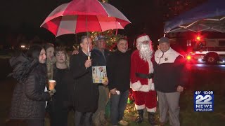 Springfield neighborhood residents gather for annual Christmas tree lighting