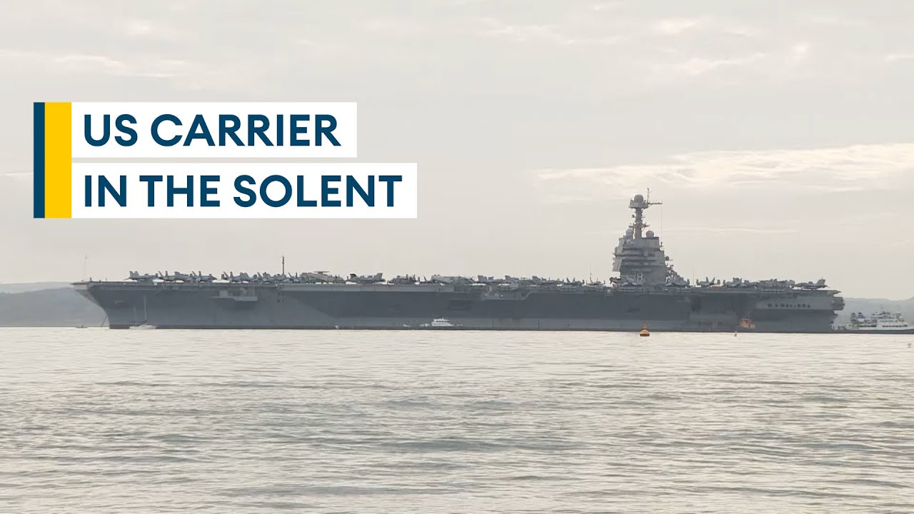 US Navy aircraft carrier USS Gerald R Ford anchors off UK coast YouTube