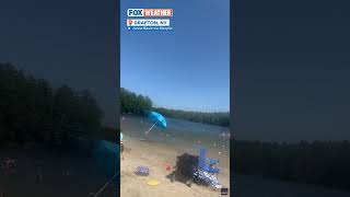 Dust devil wreaks havoc on New York beach