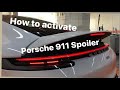 Porsche 911 spoiler  how to activate