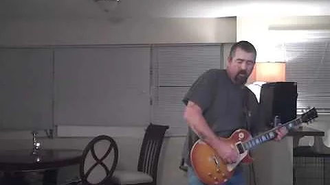 Jim Meadows plays guitar