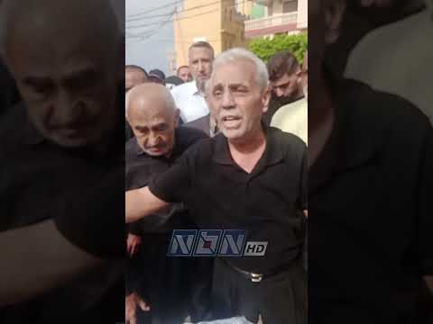 شه   يدنا كان يج  اهد من أجل قوت عيشه ولففناه بالعلم اللبناني