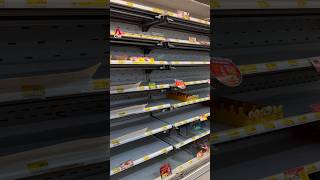 Empty shelves, snaking queues as Bangkok braces for prolonged flooding