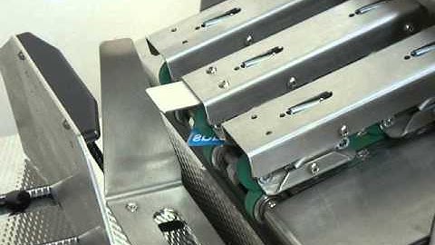 Friction feeder - Vacuumatic TCF - Counting small odd shaped iron on badges ITW test 1