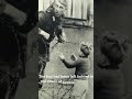 An East German soldier helps a little boy  #photohistory #history