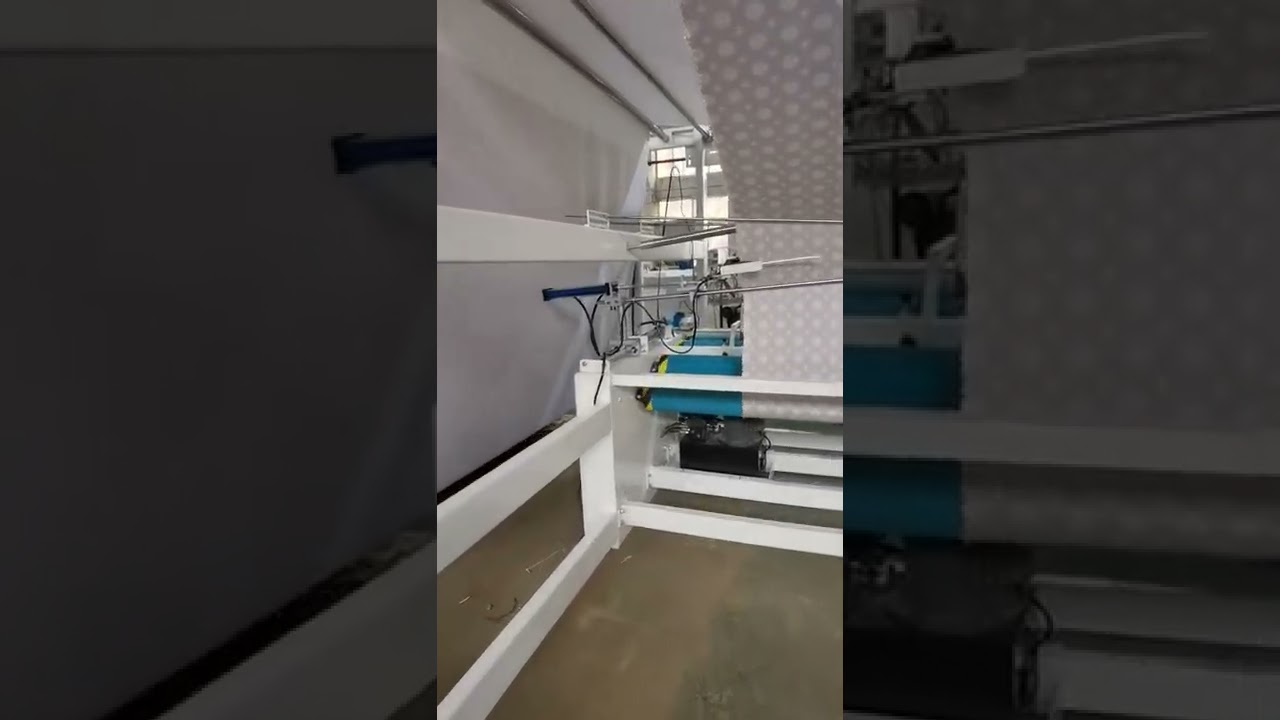 Let's see how the Rehow fabric folding machine works