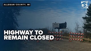 Part of major Michigan highway closed after semi-truck crashes into overpass for third time