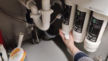 How do you change the filter on the Frizzlife Water Filtration System?