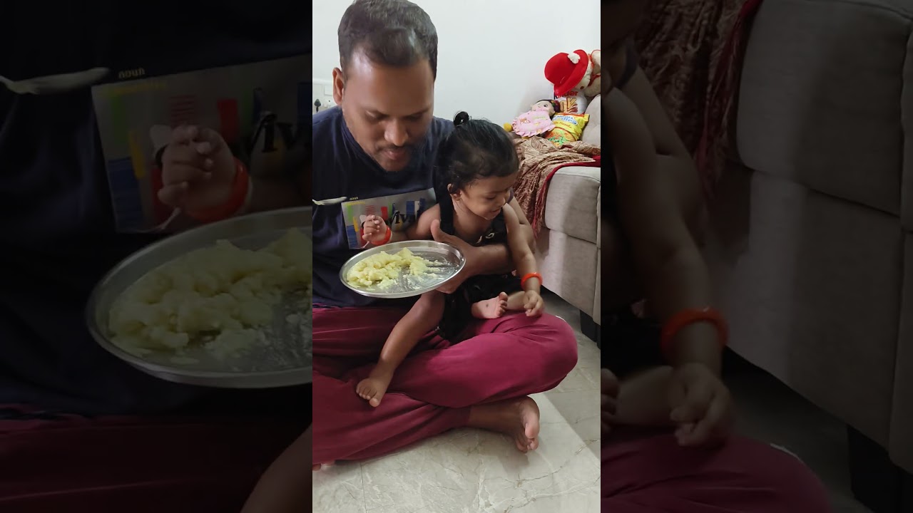 Dad feeding daughter # food 